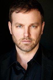 Todd Matthews as Dr. Vance in The Holiday Sitter 2022