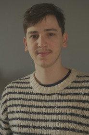 Miguel Oyens as Narrator 1 in A Dogs Day 2023