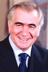 Christos Tsagas as Mimis in Here We Are! 2004