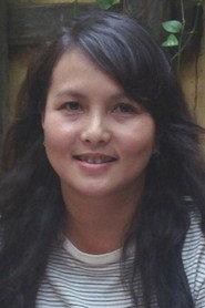 Mai Phương as Năm in Trapped 1990