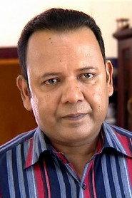Santhosh Kurup as Sreeraj's father in Crocodile Love Story 2013