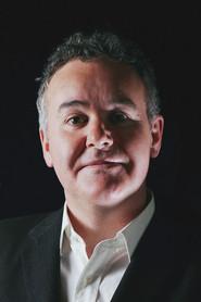 Adam Curtis as Narrator in Bitter Lake 2015