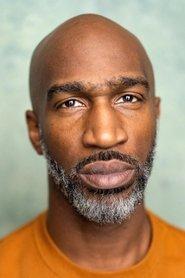 Roger Ajogbe as Pa in Little Bone Lodge 2023