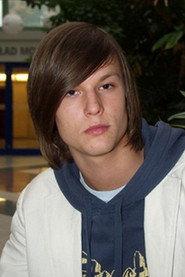 Michał Marciniak as Adam in Fabryka 2007