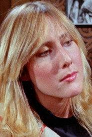 Ashley Brooks as Reba Sue Craven in Demented Death Farm Massacre 1972