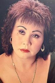 Hoàng Lan as Bà Tư Xị in A Reluctant Fighter 1992