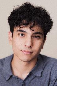 Ali Hadji-Heshmati as Warren in Bad Education: A Christmas Carol 2023