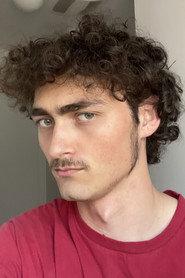 Noah Wallace-LaGue as Calvin in Dead Dogs Still Bark 2023